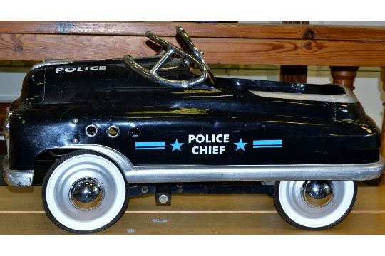 vintage police pedal car