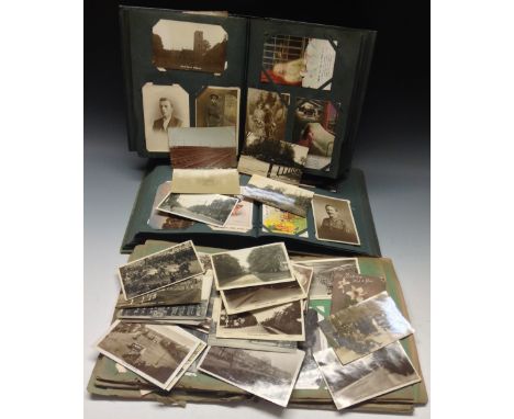 Postcards, Edwardian and later in three large well filled albums, including large group of street scenes including many rp Ma