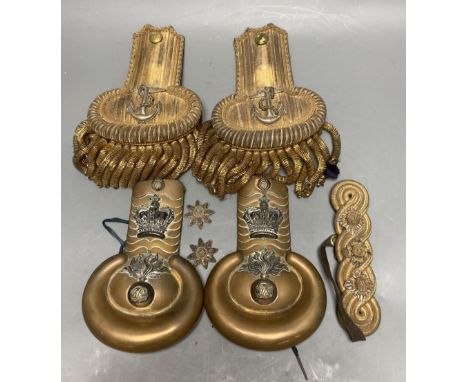 Two pairs of epaulettes with one shoulder bar, longest 24cm