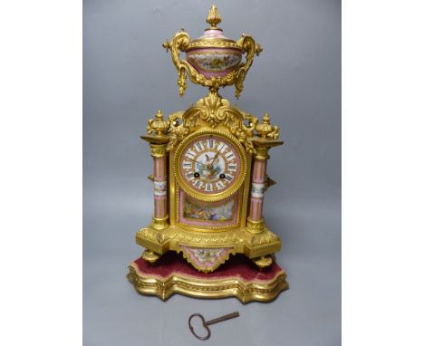 A French ormolu and porcelain mantel clock on plinth, overall height 43cm