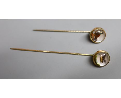 Two yellow metal and Essex crystal stick pins, decorated with game birds, largest 72mm, gross 5.8 grams.CONDITION: Indistinct