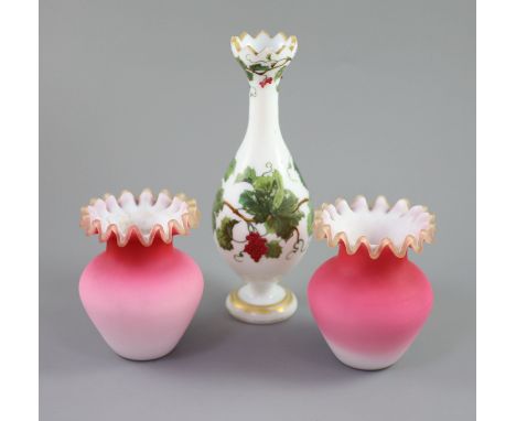 A French opaline glass vase with applied 'grapes' and a pair of Webb style ruby and white glass vases, tallest 26cmPlease not