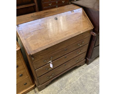 A George III mahogany fall front bureau, with brass swing handles, on bracket feet, width 90cm, depth 50cm, height 96cm