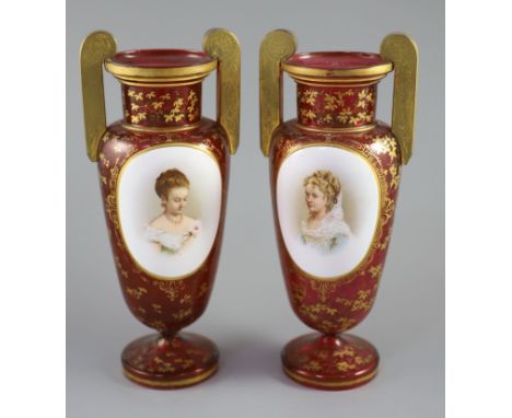 A pair of Bohemian gilt decorated ruby glass two handled vases, late 19th century, height 32cmPlease note 5% Import duty will