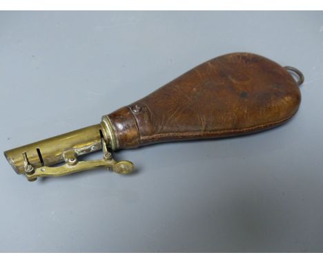 A 19th century brown leather and brass powder flask, overall length 23cm