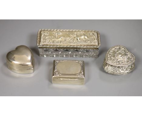 Two Victorian/Edwardian silver heart shaped pill boxes (one with holes), a rectangular snuff box and a toilet box.
