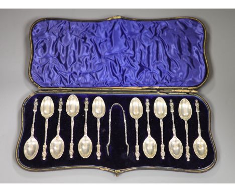 A late Victorian cased set of twelve silver apostle teaspoons and tongs, William Hutton &amp; Sons, London, 1900.