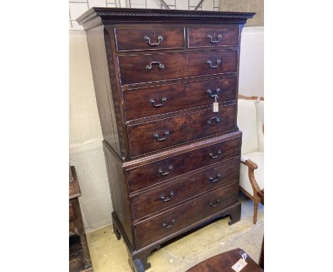 A George III mahogany chest on chest, two short and three long graduated drawers, the base with three graduated cockbeaded dr