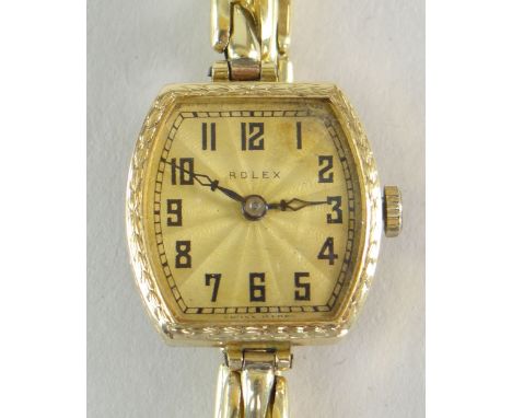A VINTAGE LADIES 18CT YELLOW GOLD ROLEX WRISTWATCH with elegant guilloche dial bearing black Arabic numerals, marked Rolex, o