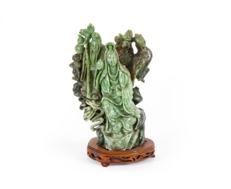 Chinese sculpture in Honan jade with the depiction of Quan Yin with a Sage || Chinese sculptuur in Honan - jade met de voorst