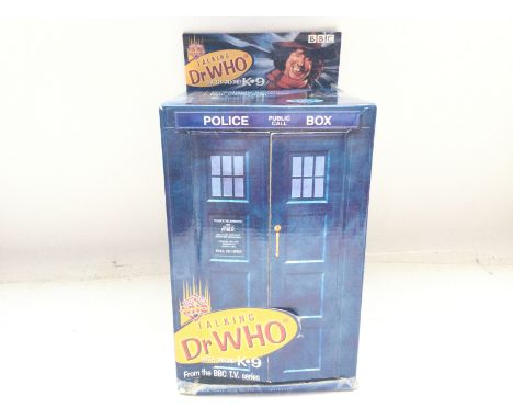A Boxed Product Enterprises Doctor Who. Talking 4Th Doctor With K-9 box is worn.