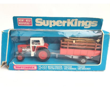 A Boxed Machbox Massey Ferguson Tractor and Trailer. #K-35. Box Is Worn.