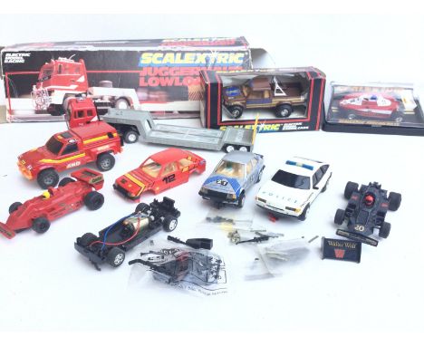 A Collection of Scalextric Vehicles including a Juggernault. A Falcon and a Collection of Spares etc.