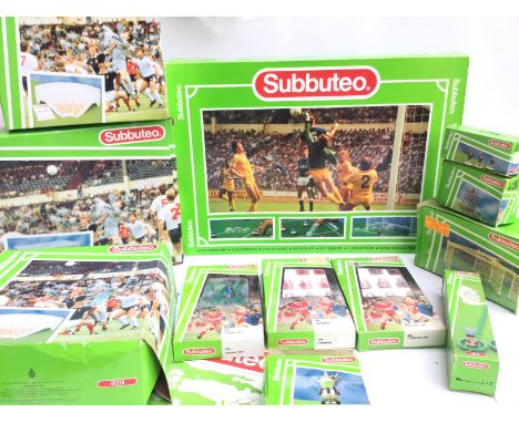 A Box Containing Subbuteo including Teams and accessories.