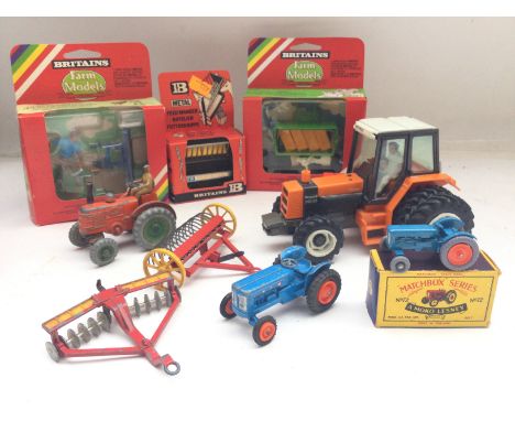 A Collection of Britains Farming Implements. A Collection of Playworn Dinky toys. A Matchbox Tractor etc.