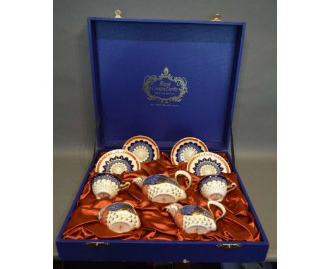 A Royal Crown Derby Quail Pattern Imari Decorated Breakfast Set comprising two cups and saucers, two side plates, teapot, cre