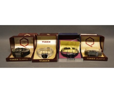 A Timex Quartz Digital Wristwatch, together with three other, within original boxes 