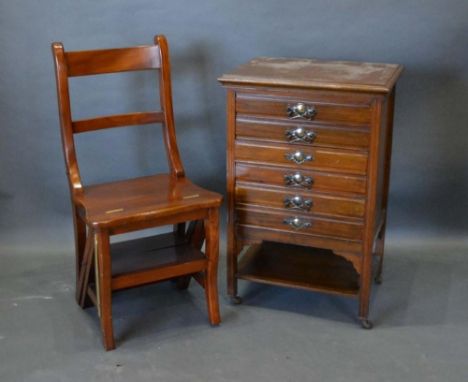 An Edwardian Music Cabinet with six drawers, together with a metamorphic library step chair 