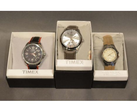 A Timex Perpetual Calendar Stainless Steel Cased Gentleman's Wristwatch with leather strap, together with two other Timex wri