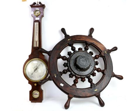 Mahogany wheel barometer by Newcomb & Mansell, Opticians, 35 Wapping, Liverpool and a "Ships" wheel 82cm dia