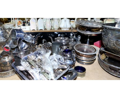 A collection of silver plate, mostly 20th century, to comprise coffee pots, tea pots, various coasters, toast racks, a wine b