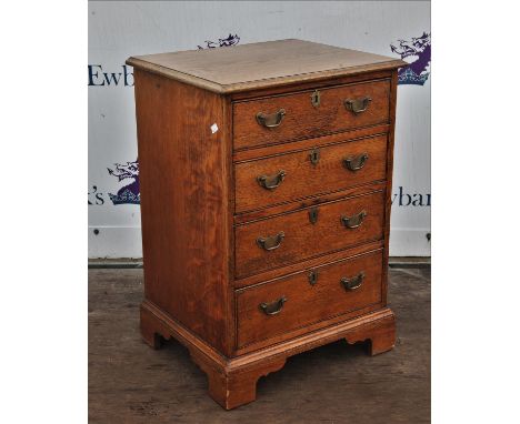 Early 20th century oak four drawer chest of small proportions on bracket feet H80cmsCondition Report:  General wear and tear 