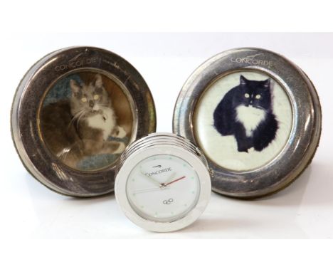 Pair of British Airways silver oval form photo frames and a cased Concorde Links of London travel alarm clock