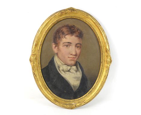 Nineteenth-century British School, oval portrait of a young man, oil on board, framed, 38 x 28cm, framed.