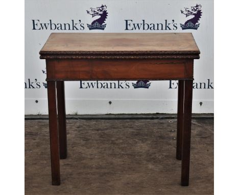 Georgian mahogany card table, with twin flap top, lacking baize surface, carved edge, on square beaded legs, 74cm high x 75cm