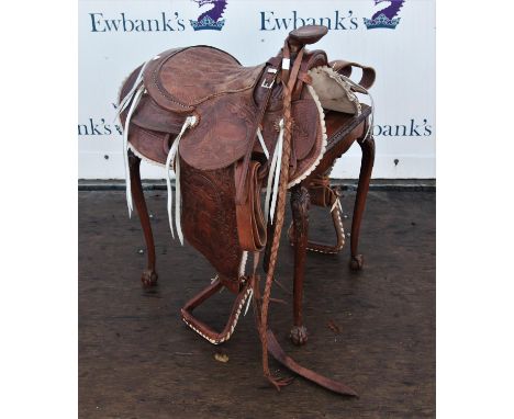 Leather saddle with whip