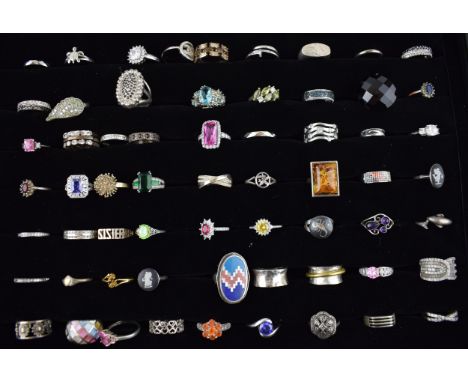 A large collection of silver rings to include varying styles, sizes, gemstones and periods, (60 silver rings), totalling 289 