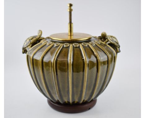 Mid to late 20th century ceramic lamp base, with tortoise decoration, Chinese style, mounted onto wooden base, 33cm diameter.