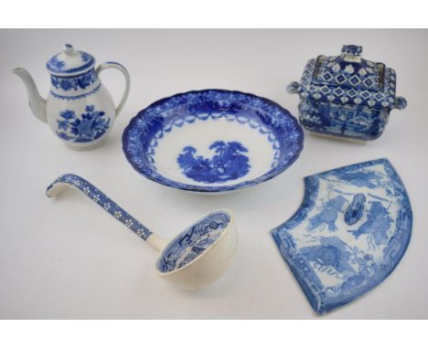 A group of 19th century blue and white transfer-printed pieces, c. 1810-80. To include a Willow pattern soup ladle, a covered