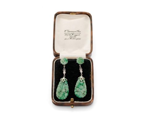 18ct gold Art Deco earrings with carved jade decoration, each set with a diamond, in period box, 5.5cm long.  