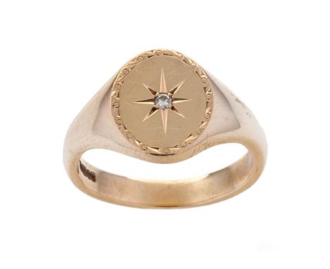 9ct gold gents ring set with diamond chip amongst star decoration, size X, 8.7 grams.  