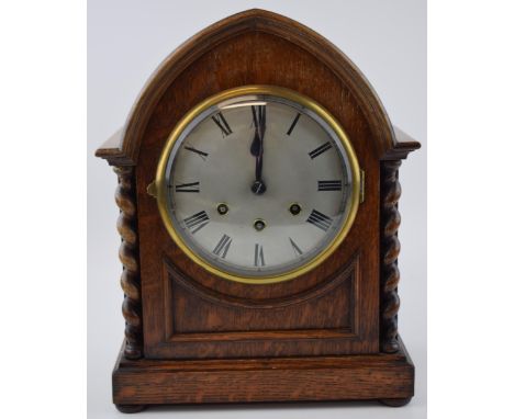 An early 20th century wooden cased Westminster chiming bracket / mantel clock, by Gustav Becker, with key and pendulum, circu