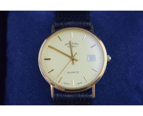 A boxed 9ct gold gentleman's Rotary wristwatch. Hallmarked case and in it's original mahogany box. Gold tone circular dial wi