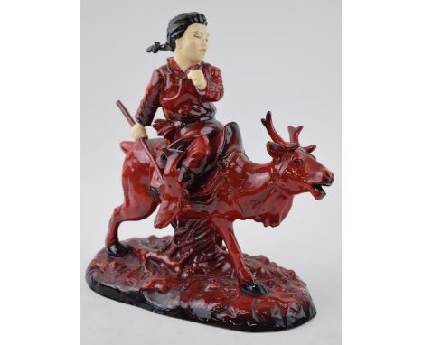 Peggy Davies Ruby Fusion figure of an Inuit on an elk moose, 23cm long.  In good condition with no obvious damage or restorat