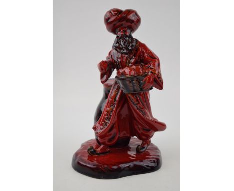 Royal Doulton Flambe figure The Lamp Seller HN3278.  In good condition with no obvious damage, on very close inspection, the 
