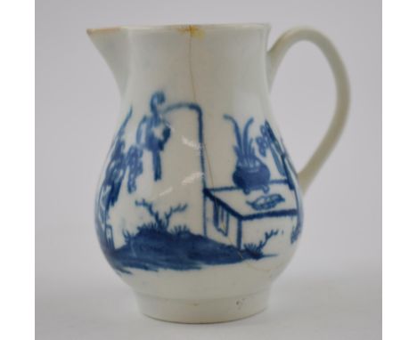 An 18th century blue and white porcelain Worcester Bird in the Ring pattern small jug, c. 1760.  Crack to one side, chip to s