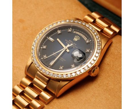 18ct yellow gold Rolex Oyster Perpetual Day-Date gentleman's wristwatch with blue dial, 18ct gold bracelet marked 750. Diamon