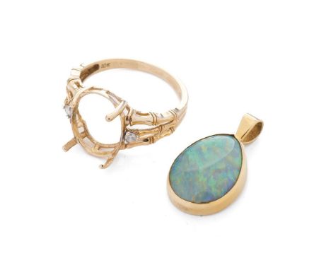 A 9ct gold pendant with opal-style insert together with a 9ct gold ring setting, combined 4.8 grams (2).