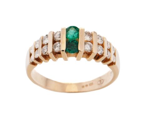 Diamond &amp; emerald set dress ring, set in 14ct gold with 16 diamonds and two emeralds, size M, weight 4.25g.  