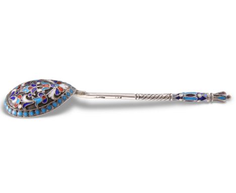 A RUSSIAN SILVER AND ENAMEL SPOON, marks rubbed, picked out with blue, white and red enamels. 11cm longCONDITION REPORTWeighs