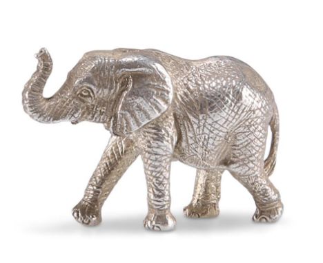 A STERLING SILVER ELEPHANT,&nbsp;by Patrick Mavros, Zimbabwe, modern, the miniature model realistically cast walking with tru