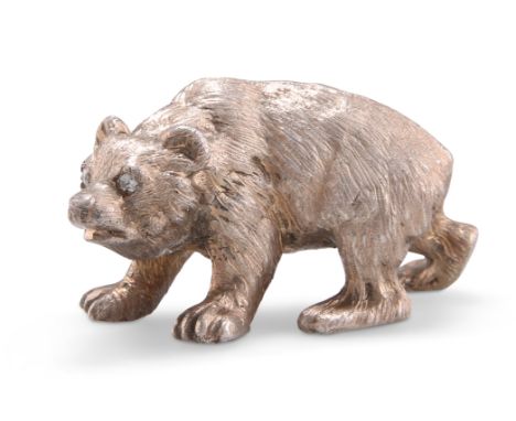 A RUSSIAN CAST SILVER MODEL OF A BEAR, with 'gem'-set eyes, marked to foot. 5.5cm long, 2 troy ounces