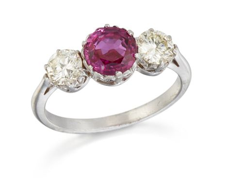 A RUBY AND DIAMOND THREE STONE RING,&nbsp;a round-cut ruby between round brilliant-cut diamonds. Estimated total diamond weig