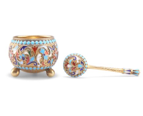 A RUSSIAN SILVER AND ENAMEL SALT AND SPOON, by Gustav Klingert, Moscow, 1908-17, picked out with red, blue, green and white e