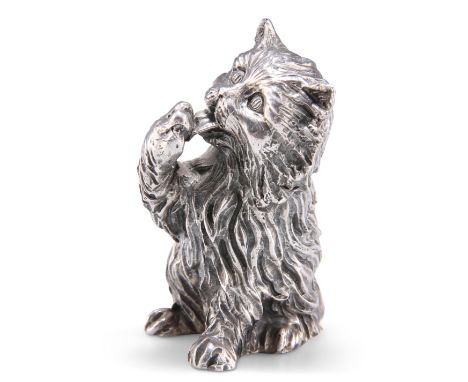 A SILVER MODEL OF A CAT, signed 'TEKFORM' and stamped '925 SILVER PT', modelled sitting and licking a paw. 6.5cm high