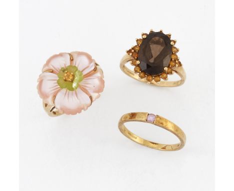 THREE 9 CARAT GOLD GEM-SET RINGS, including A SMOKY QUARTZ CLUSTER RING; A MOTHER-OF-PEARL DRESS RING; and A PINK SPINEL RING